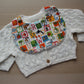 Baby bib with animal alphabet theme