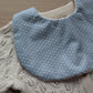 Pale blue baby bib with white stars