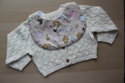 Baby bib with winnie the pooh theme