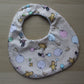 Rounded baby bib with winnie the pooh design