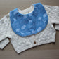 Baby bib with baby boy and animal design