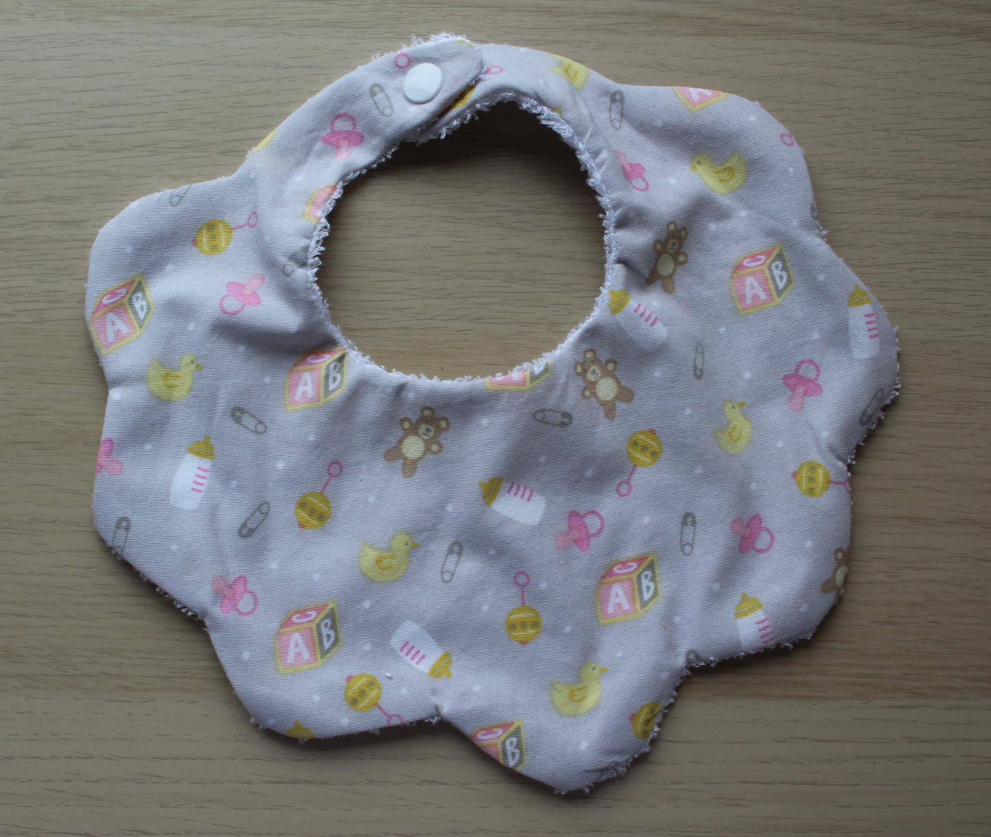 Scallop bib with teddies ducks and baby girl theme