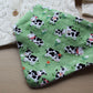 Dribble bib with cow design