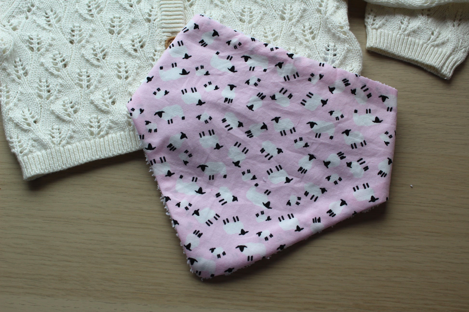 Pink dribble bib with little sheep
