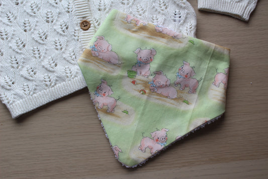 Baby bib with little pig design