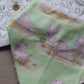 Baby dribble bib featuring little pigs