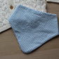 Dribble bib with mini stars on blue background