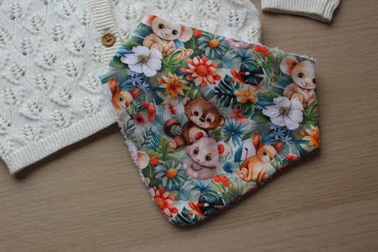 baby animal dribble bib with jungle background