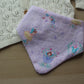 Purple dribble baby bib with fairies