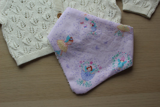 Purple dribble baby bib with fairies