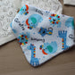 Dribble bib with blue animal designs