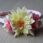 Floral headband with yellow and pink flowers