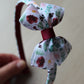 Burgundy floral patterned bow hairband