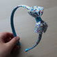 Colourful polka dot hairband with bow
