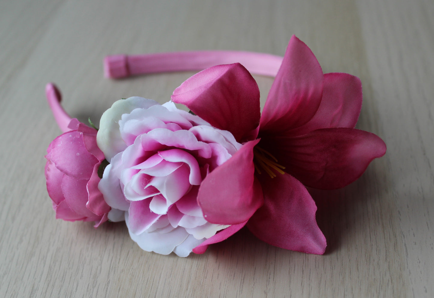 Headband with deep pink flowers 