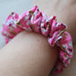 Scrunchie with pink floral pattern