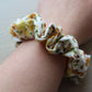 Corduroy hair scrunchie in autumn floral pattern