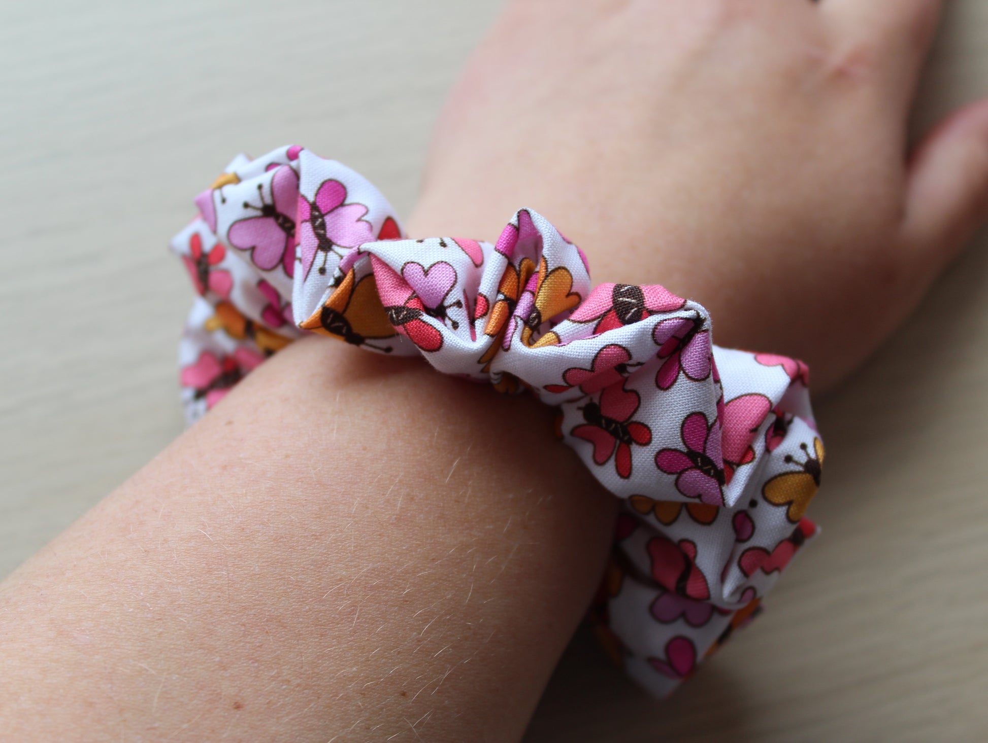 Bold butterfly pink and orange scrunchie