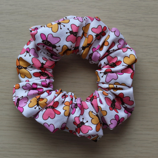 Scrunchie with bold pink and orange butterflies