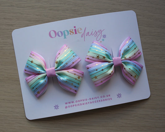 Pastel rainbow coloured bow hair clips with stars