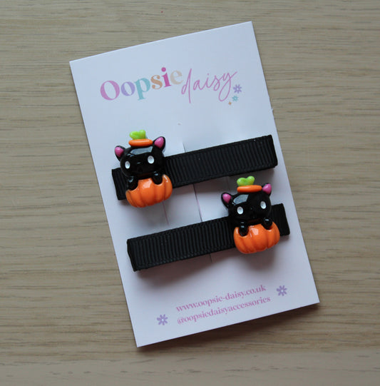 Halloween themed hair clips with black cat and pumpkin