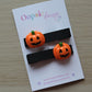 Hair clips with Halloween themed scary pumpkins