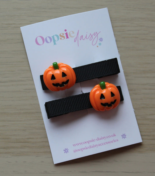 Hair clips with Halloween themed scary pumpkins