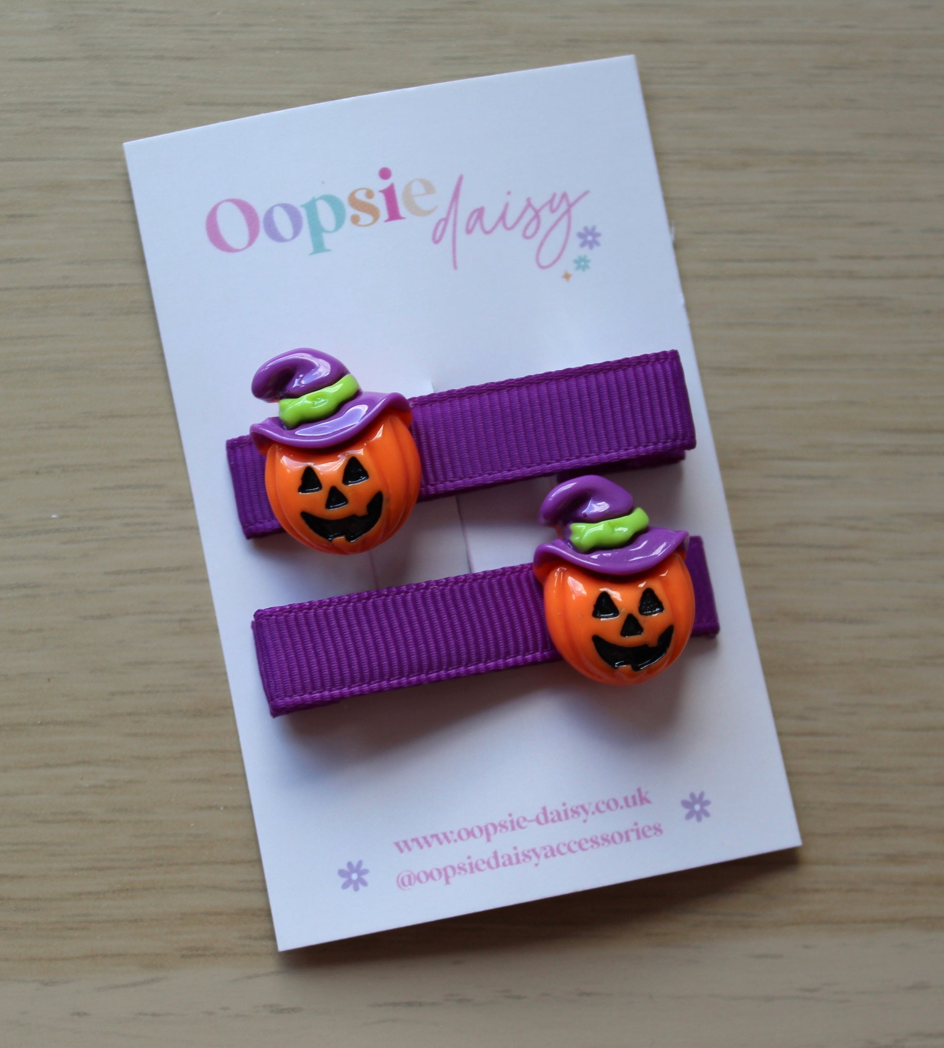 Halloween themed hair clips with scary pumpkins