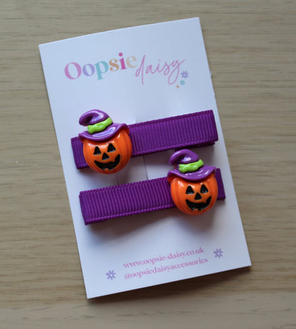 Halloween themed hair clips with scary pumpkins