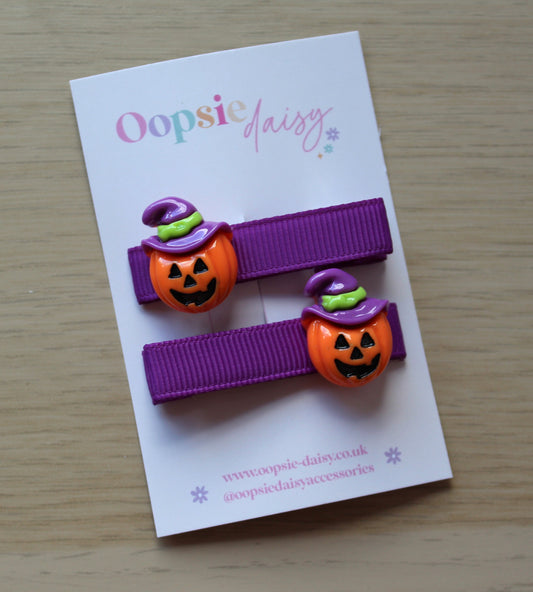 Halloween themed hair clips with scary pumpkins
