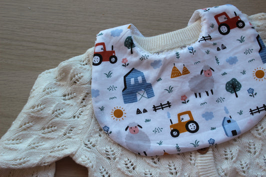 Baby bib with farm animal dsign