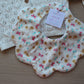 Floral and butterfly ditsy baby bib 