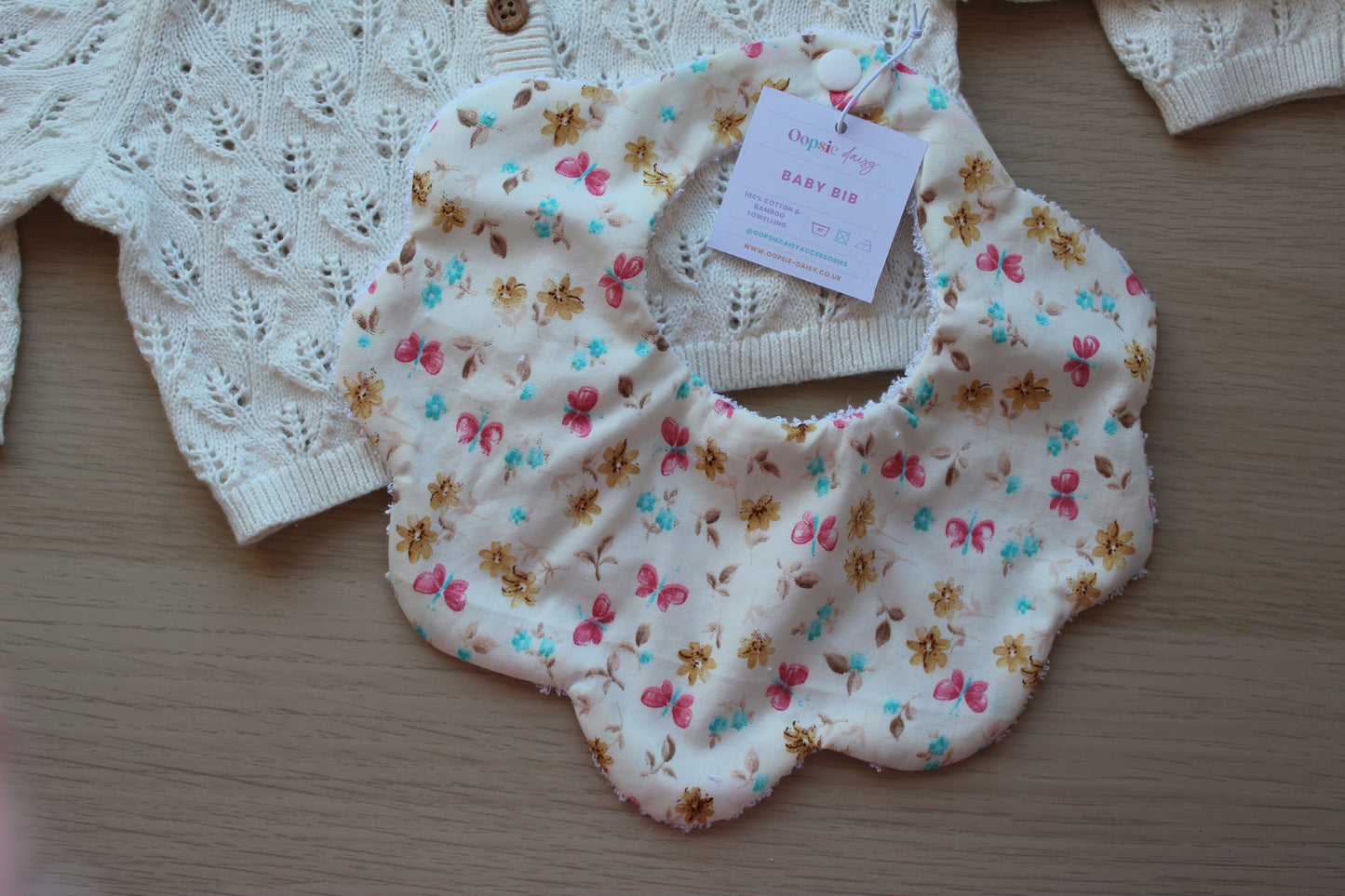 Floral and butterfly ditsy baby bib 