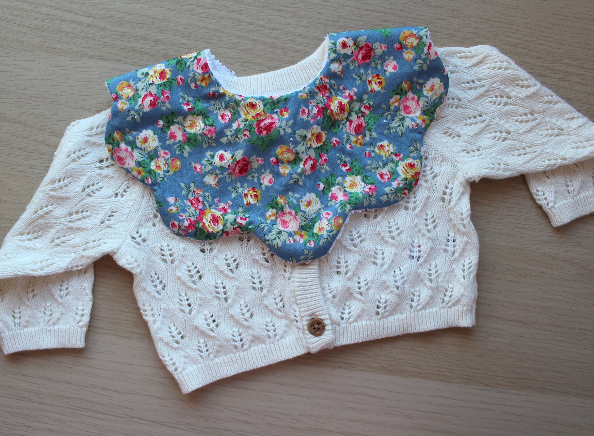Colourful floral scallop baby bib