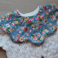 Scallop baby bib with beautiful rose pattern