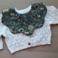 Dark green floral scallop baby bib

