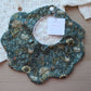 Scallop baby bib with dark green floral Morris design