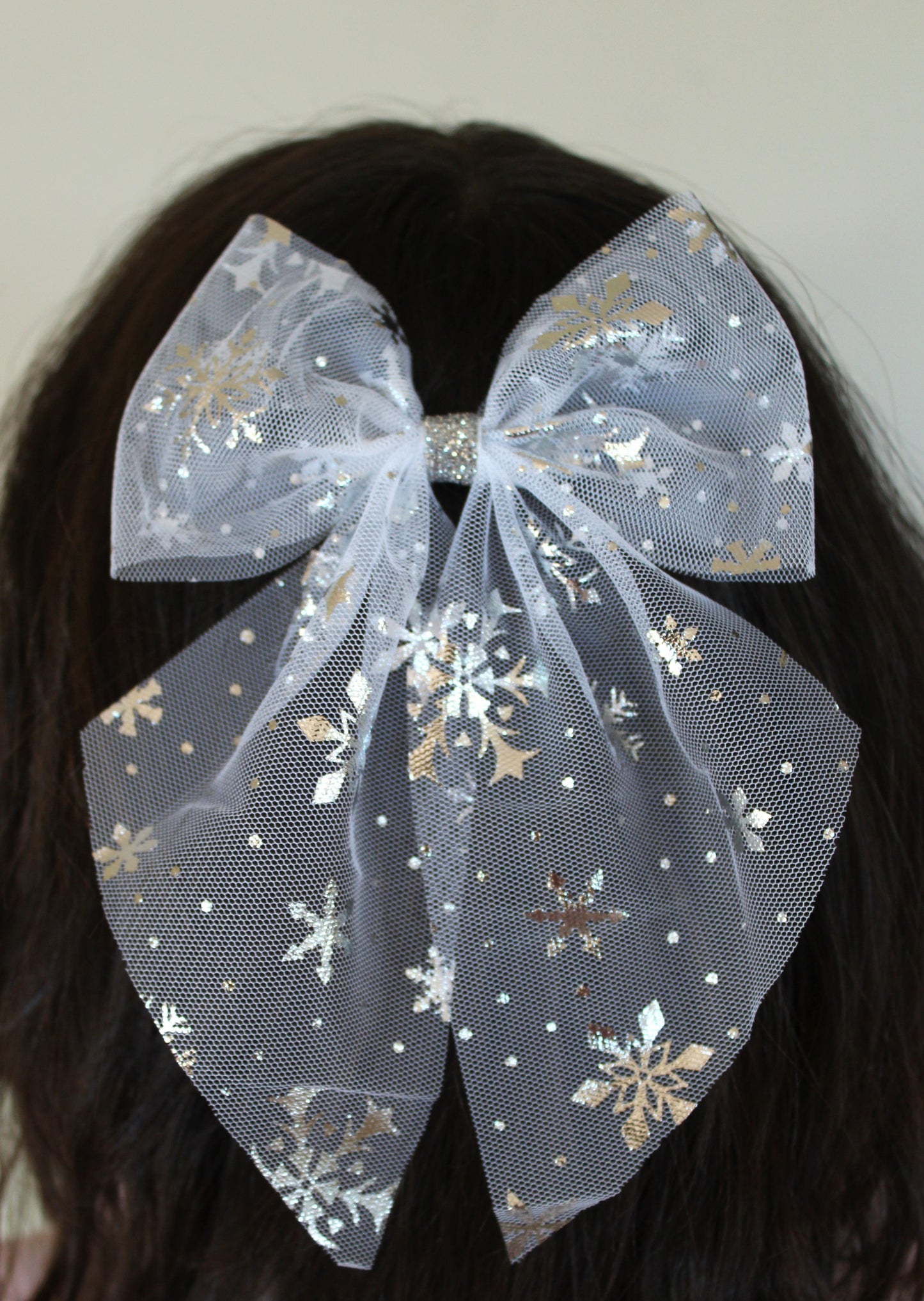 White snowflake hair bow with sparkles