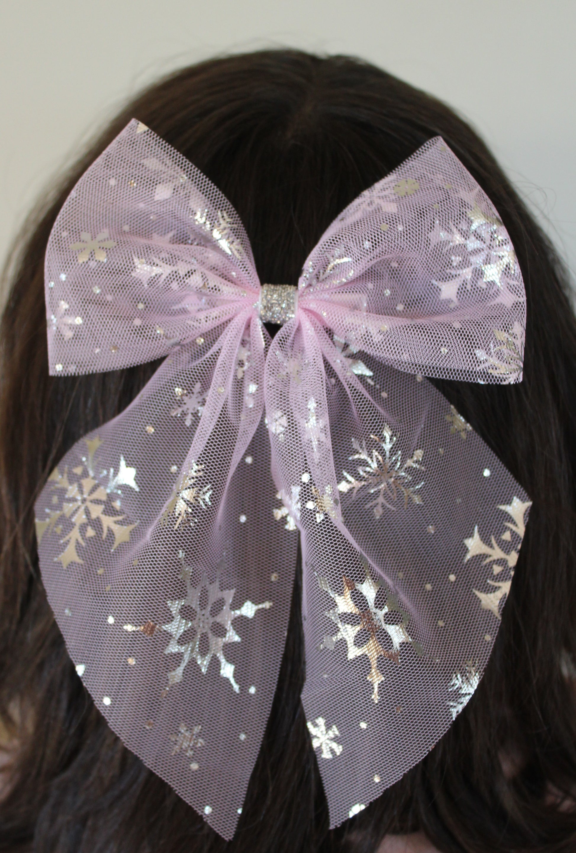 Foiled snowflake hair bow in pink