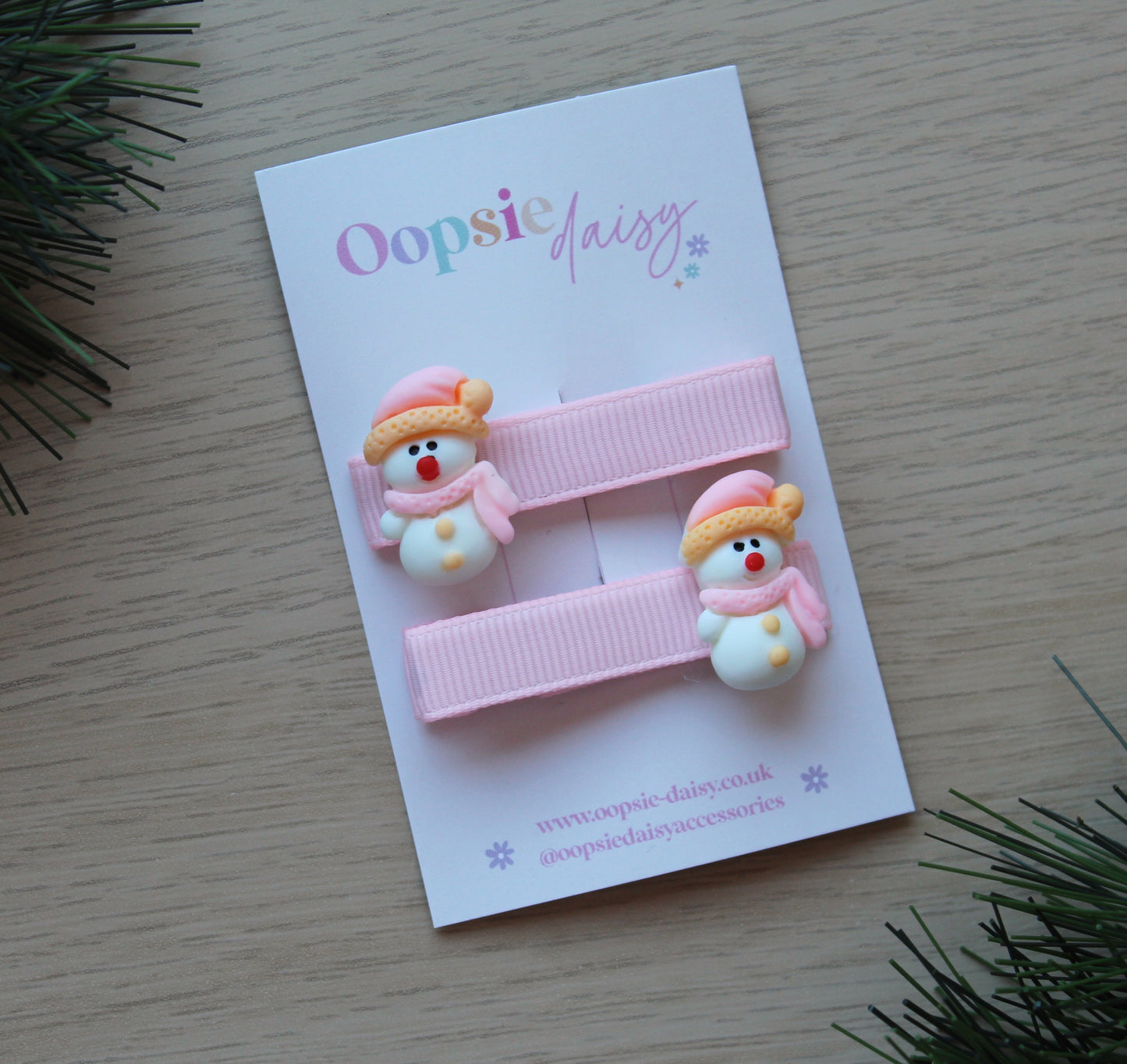 Pink Christmas hair clips with snowman