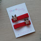 Red festive hair clips with Rudolph reindeer