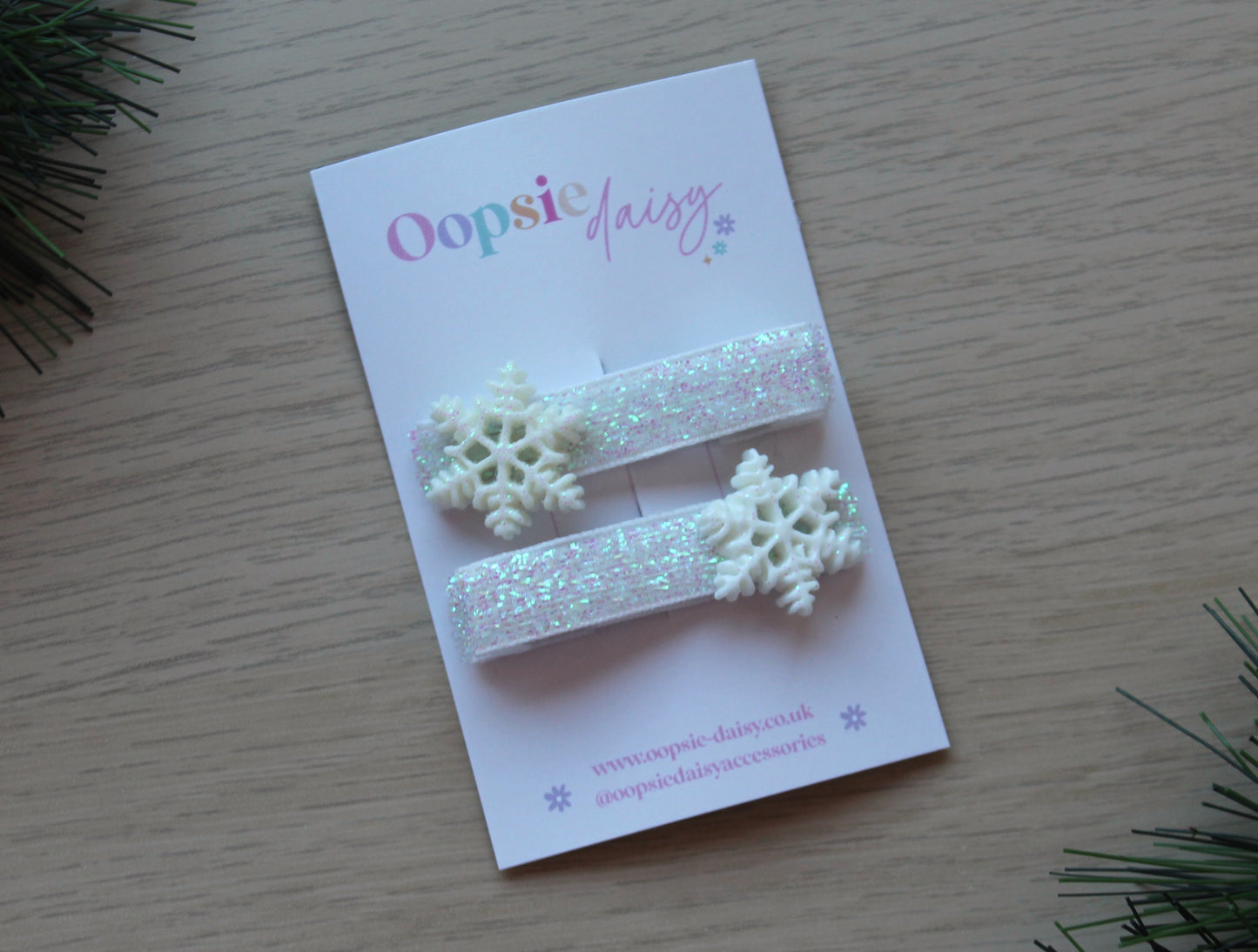 Sparkly hair clips with festive snowflake