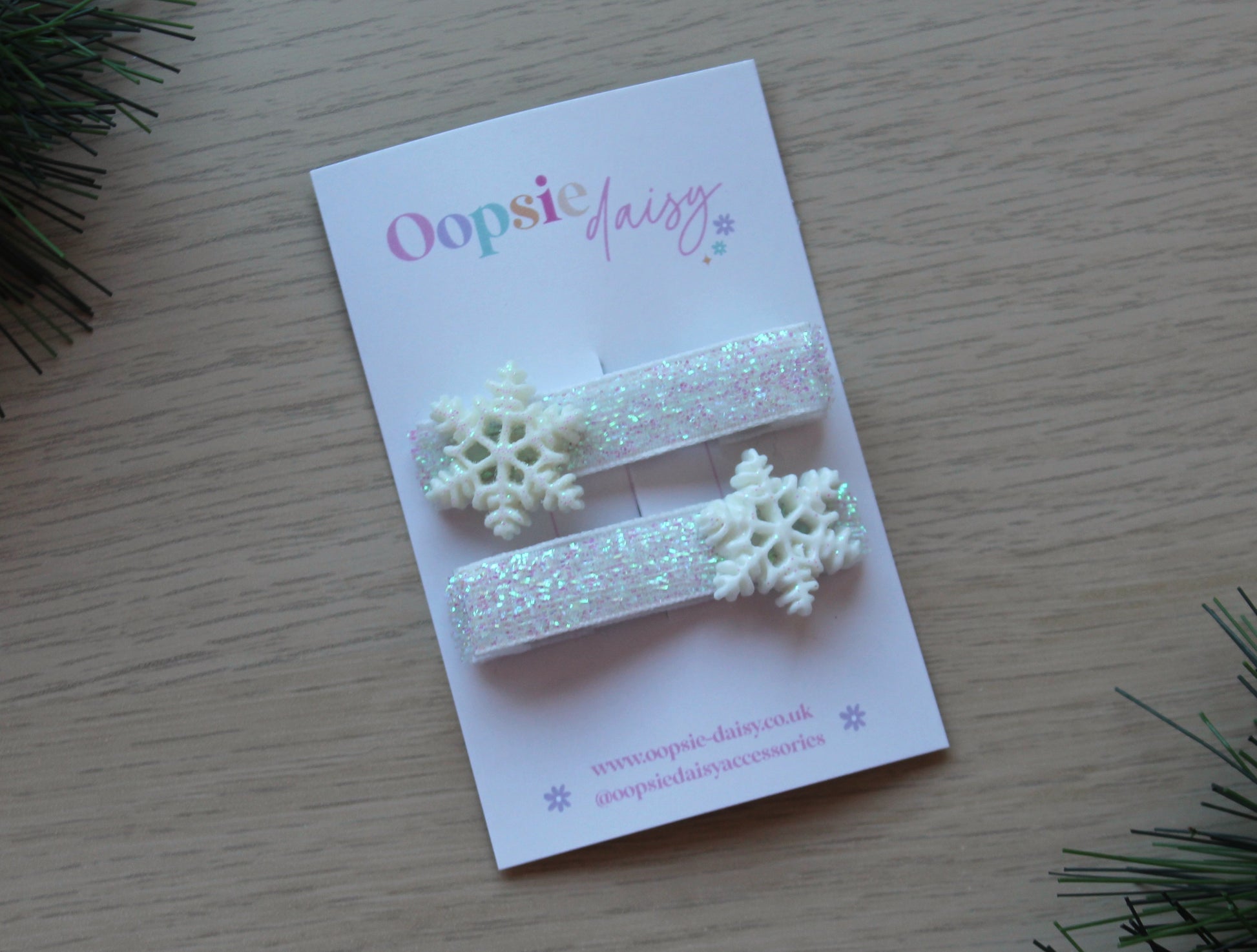 Sparkly hair clips with festive snowflake