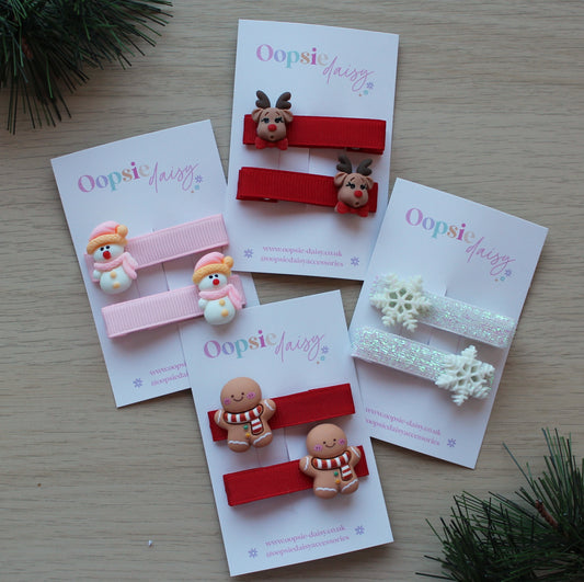 Christmas themed 3d hair clips with snowman, snowflake, gingerbread man and rudolph