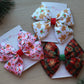 Christmas themed hair bows with santa, snowflakes and gingerbread man