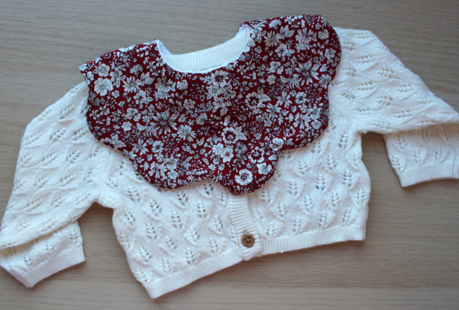 Red floral scallop baby bib