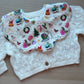 Baby bib with vintage festive design