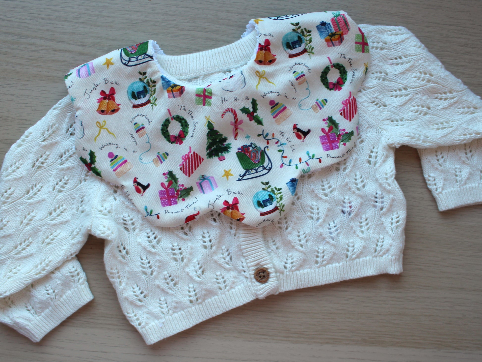 Baby bib with vintage festive design