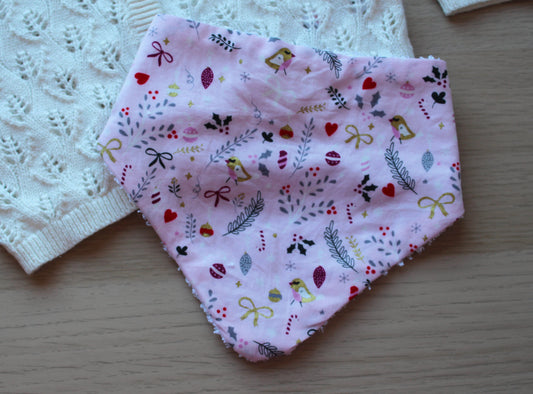 Pink festive baby bib with robins