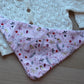 Baby bib with pink festive theme